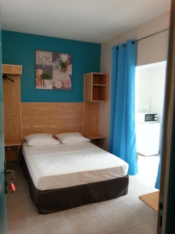 L'Annexe 66 , Saint Denis Centre Ville , A 200 M De La Rue Pietonne , Du Petit Marche Et Du Leader Price , Sur Une Rue Calme, Parking Gratuit Sur La Rue Rum bild